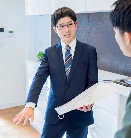 万建設興業営業