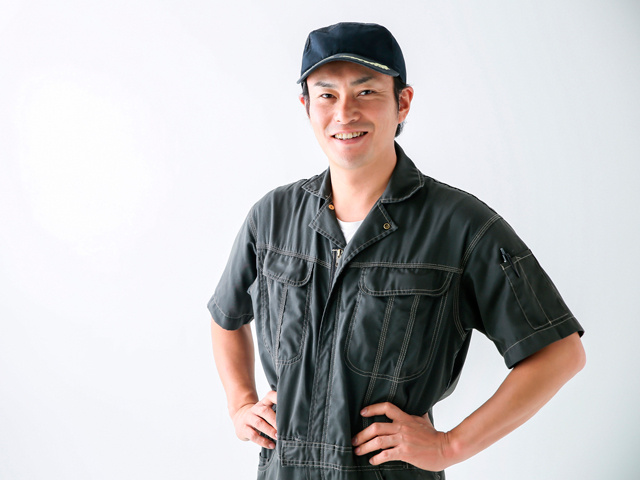 作業服の男性の写真