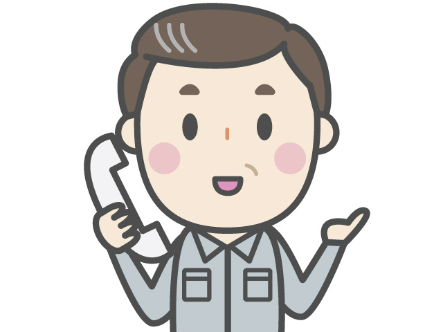 電話対応をする作業着男性のイラスト
