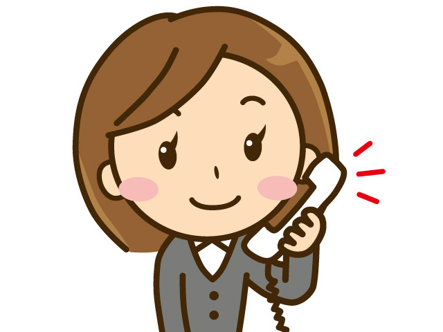 電話をするスーツ姿の女性のイラスト